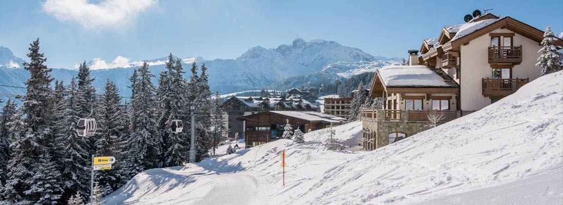 The Lodge ski in ski out chalet in Courchevel France on a sunny winter day