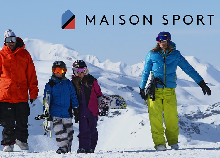 A family of snowboarders with the Maison Sport logo